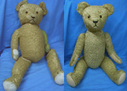 Bär aus Kunstseidenplüsch - ein Teddyarm wurde neu gestaltet, der ganze Bär wurde neu aufgebaut, gereinigt und gefüllt (Holzwolle)